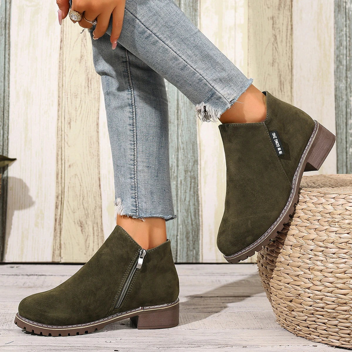 Olive green side zip ankle boots, side view