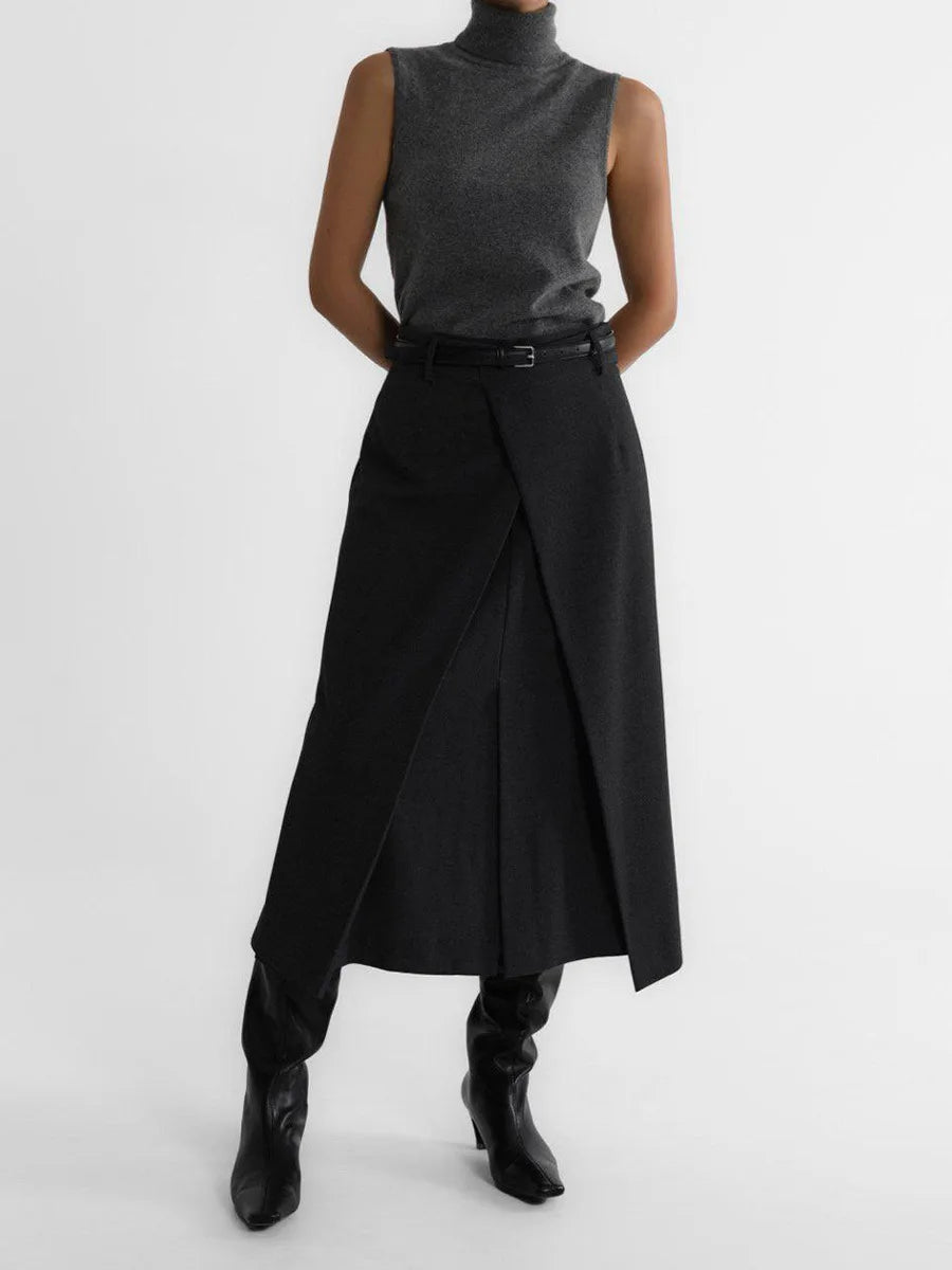 Charcoal roll neck knit tank styled with a wrap skirt and boots