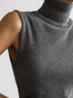 Close-up of a charcoal roll neck sleeveless knit tank