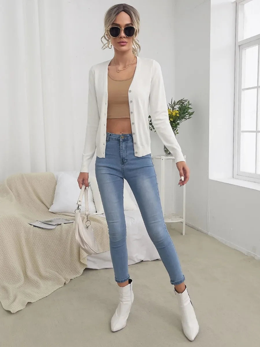 White V neck button cardigan full outfit with jeans and white boots