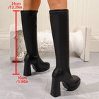 Black platform knee high boots with 34 cm shaft and 10 cm heel measurements