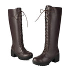 Dark brown lace-up knee high platform boots on a white background