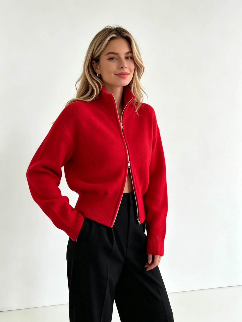 Red zip up cardigan with hand in pocket