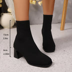 Black knit sock ankle boots with block heel, with 6 cm heel and 15 cm shaft height measurements