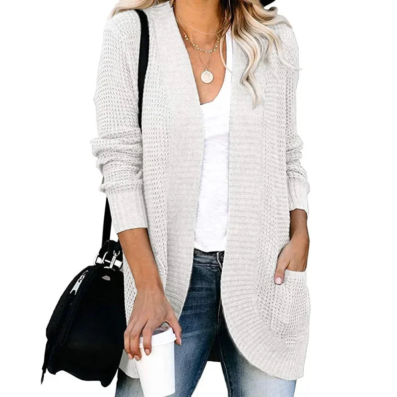 Ivory long open front cardigan worn with jeans