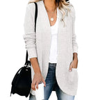 Ivory long open front cardigan worn with jeans