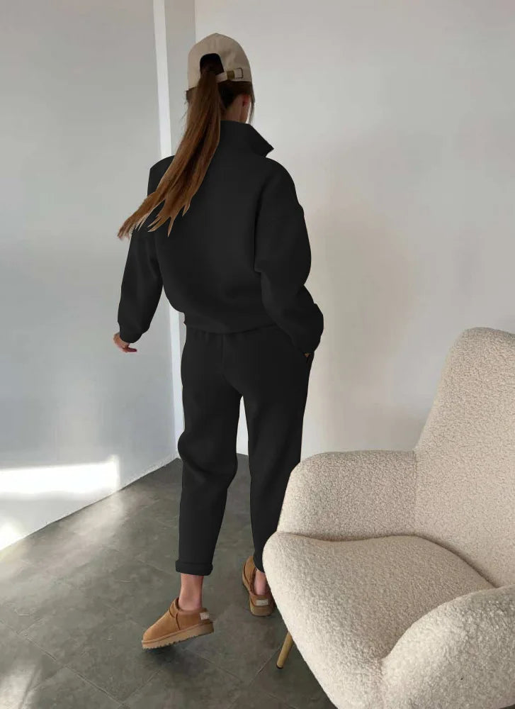 Black half button stand collar sweatshirt and jogger pants set, back view