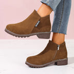 Brown side zip ankle boots styled with jeans