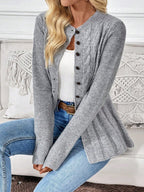 Grey round neck button cardigan worn with jeans and a white cami
