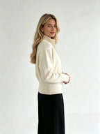 Ivory zip up cardigan, side view