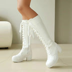 White lace-up knee high boots with chunky platform sole, front view