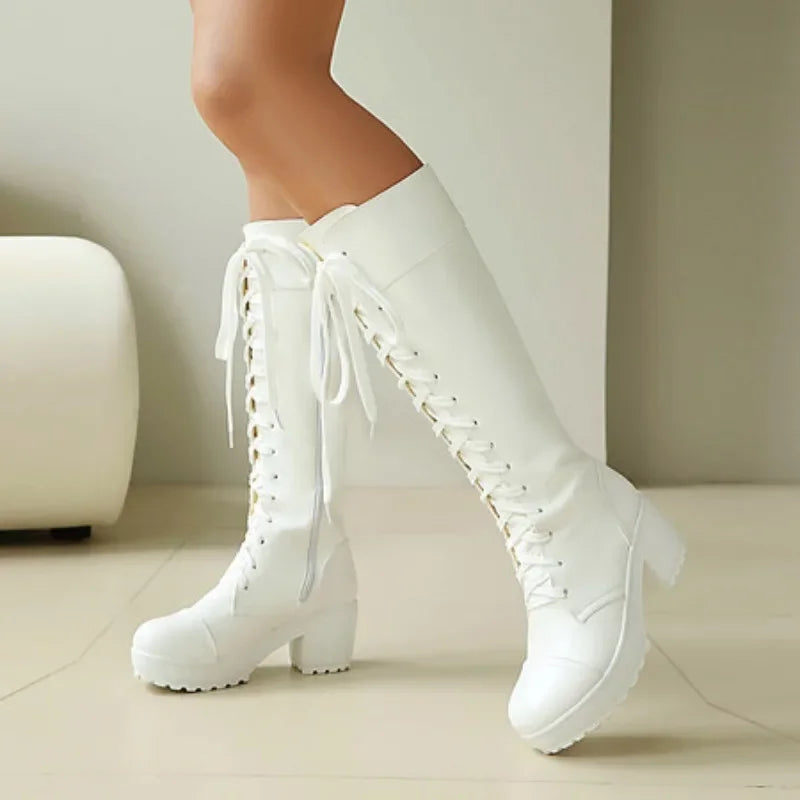 White lace-up knee high boots with chunky platform sole, front view