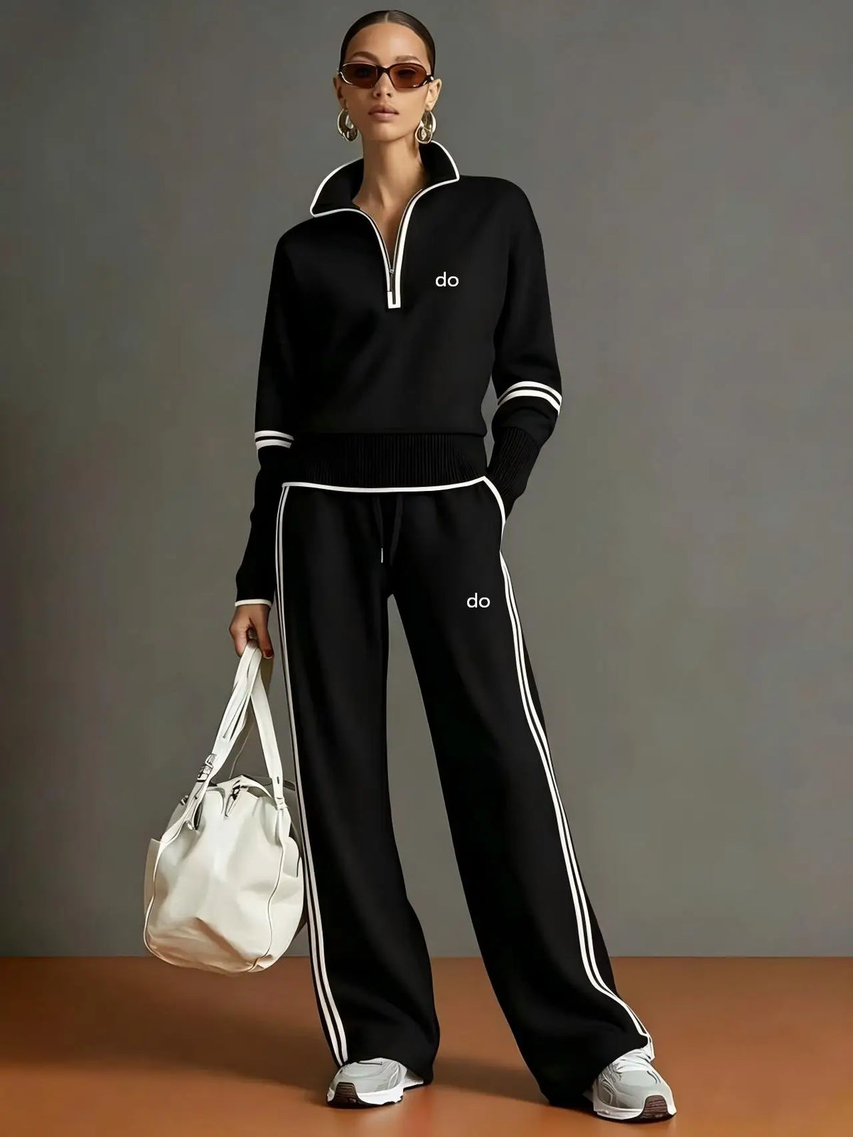 Black half zip contrast stripe sweatshirt and wide leg pants set