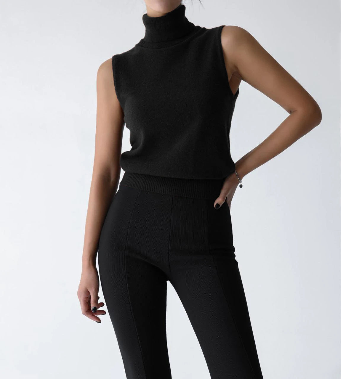 Black roll neck sleeveless knit tank, front view