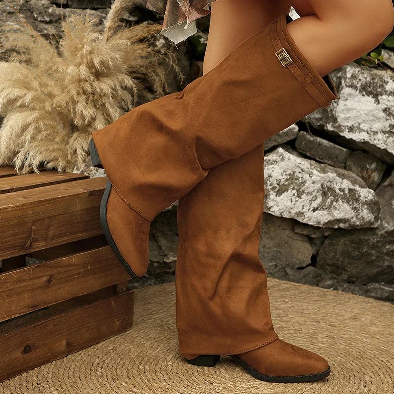 Tan brown faux suede fold over boots, worn with legs crossed
