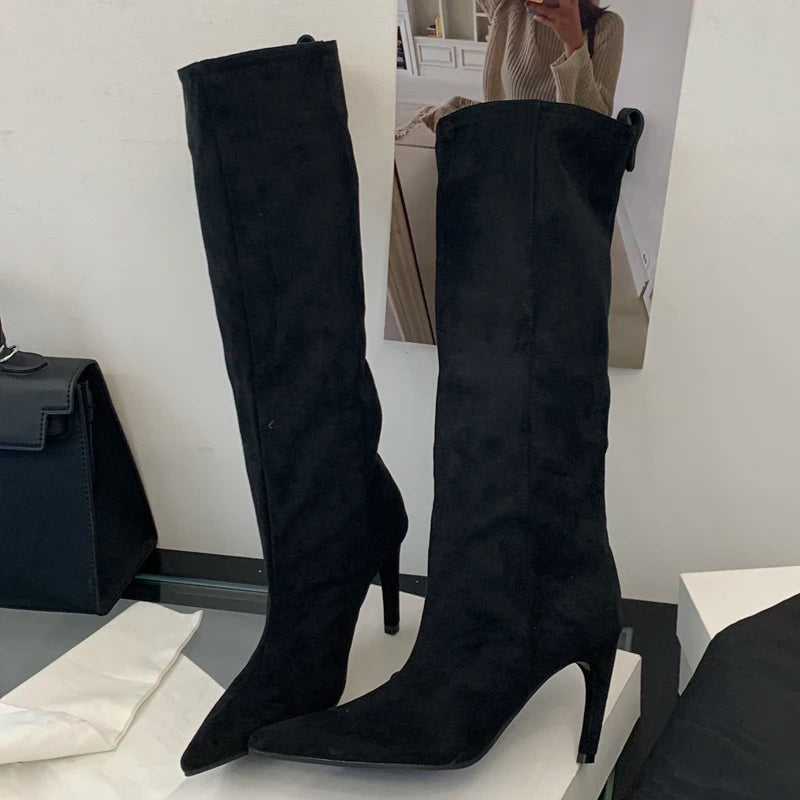 Black flock slouch knee high boots with pointed toe and thin heel