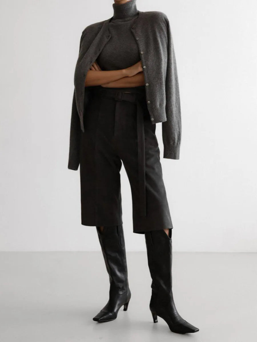 Charcoal knit tank and cardigan set styled with trousers and boots