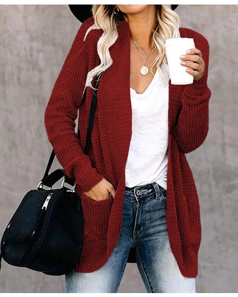 Burgundy long open front cardigan worn with jeans