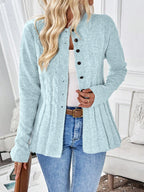 Light blue cable knit button cardigan with a flared hem