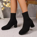Black knit sock ankle boots with block heel