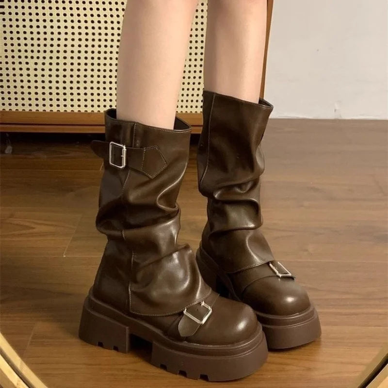 Brown mid calf biker boots with chunky platform sole and buckle straps