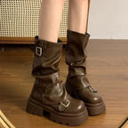 Brown mid calf biker boots with chunky platform sole and buckle straps