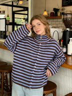 Blue and brown striped zip up cardigan, worn with jeans