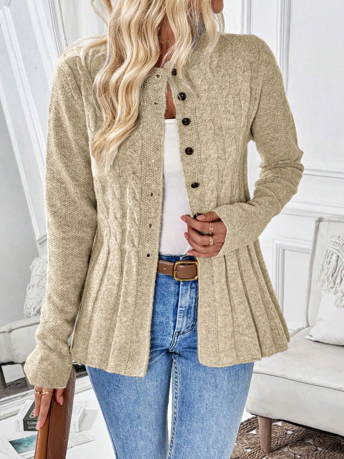 Sand cable knit button cardigan with a flared ribbed hem
