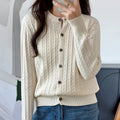 Cream cable knit crew neck button cardigan, front view
