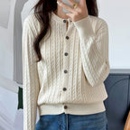 Cream cable knit crew neck button cardigan, front view