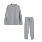 Grey high neck sweater and drawstring trouser set, flat lay