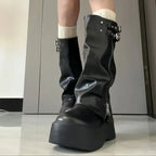 Black fleece-lined platform boots with side zip and buckles
