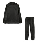 Black high neck sweater and drawstring trouser set, flat lay