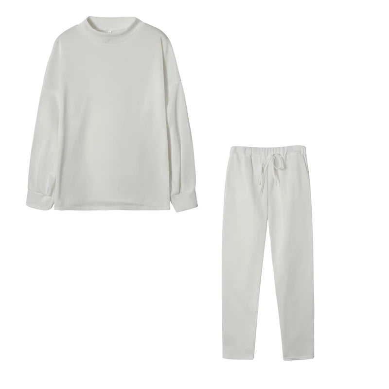 Cream high neck sweater and drawstring trouser set, flat lay