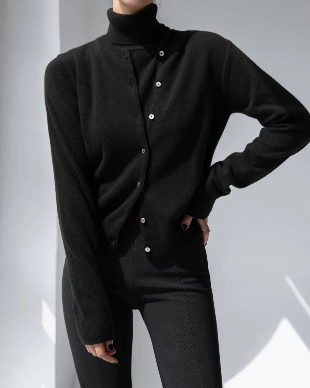 Black button knit cardigan, front view