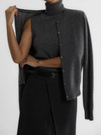 Charcoal knit tank and cardigan set, cardigan draped over the shoulder