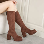 Brown platform knee high boots with square toe and block heel