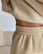 Beige half button stand collar sweatshirt and jogger pants set, waistband detail