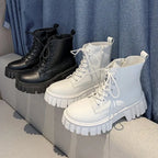 Black and white lace-up ankle boots with chunky sole side by side