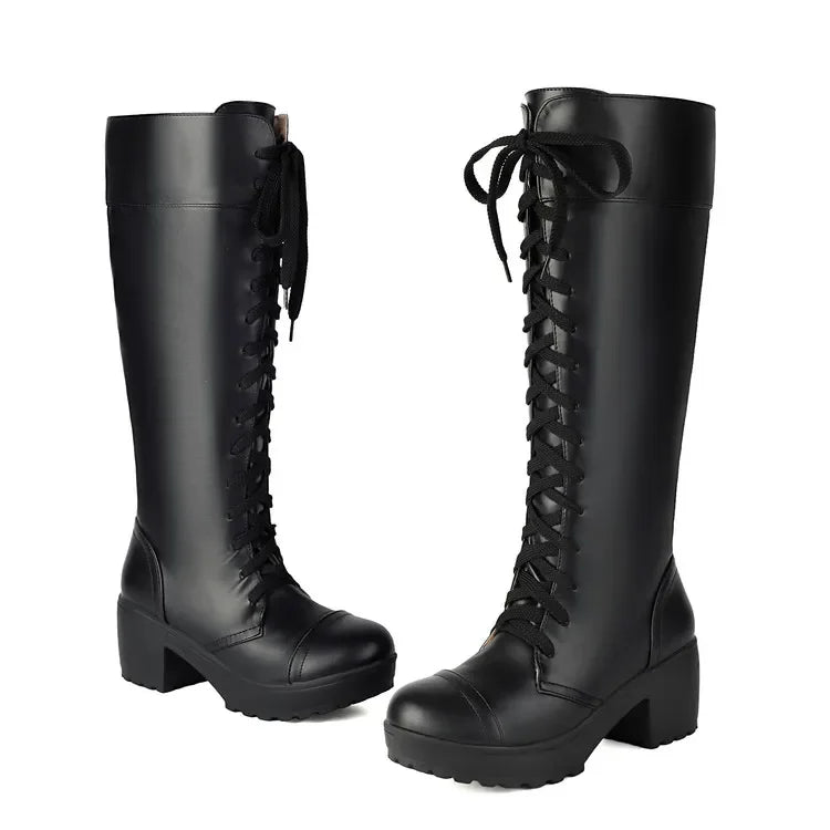 Black lace-up knee high platform boots on a white background