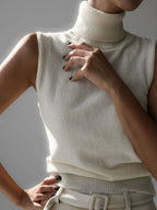 Cream roll neck knit tank with ribbed hem