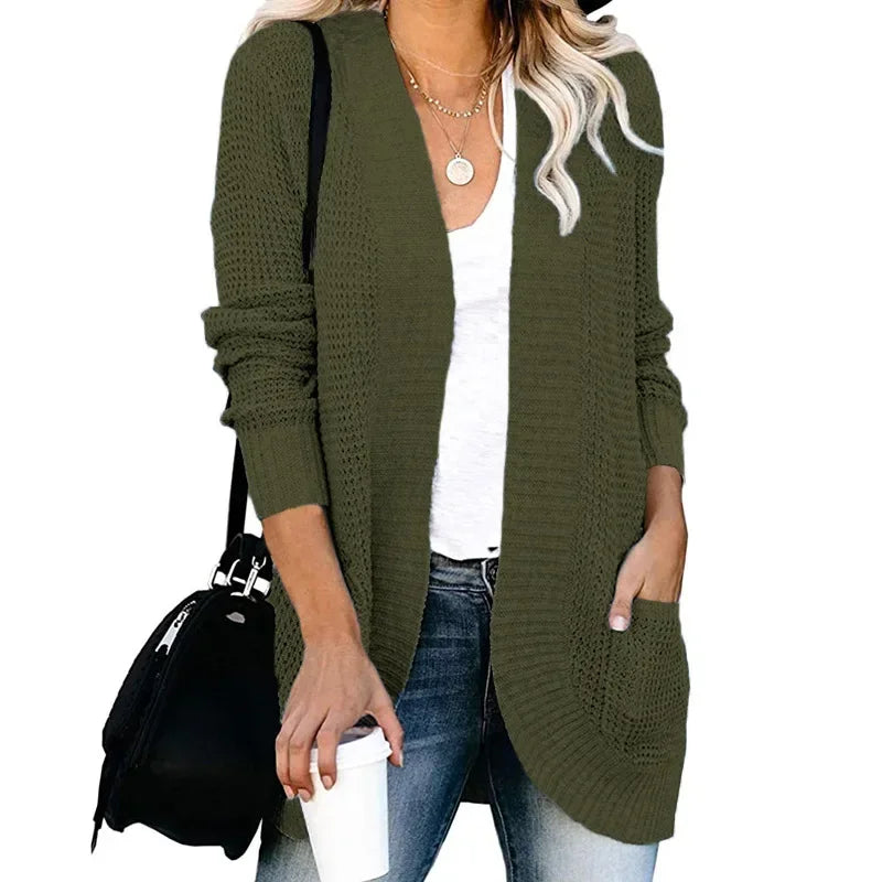 Olive green long open front cardigan worn with jeans
