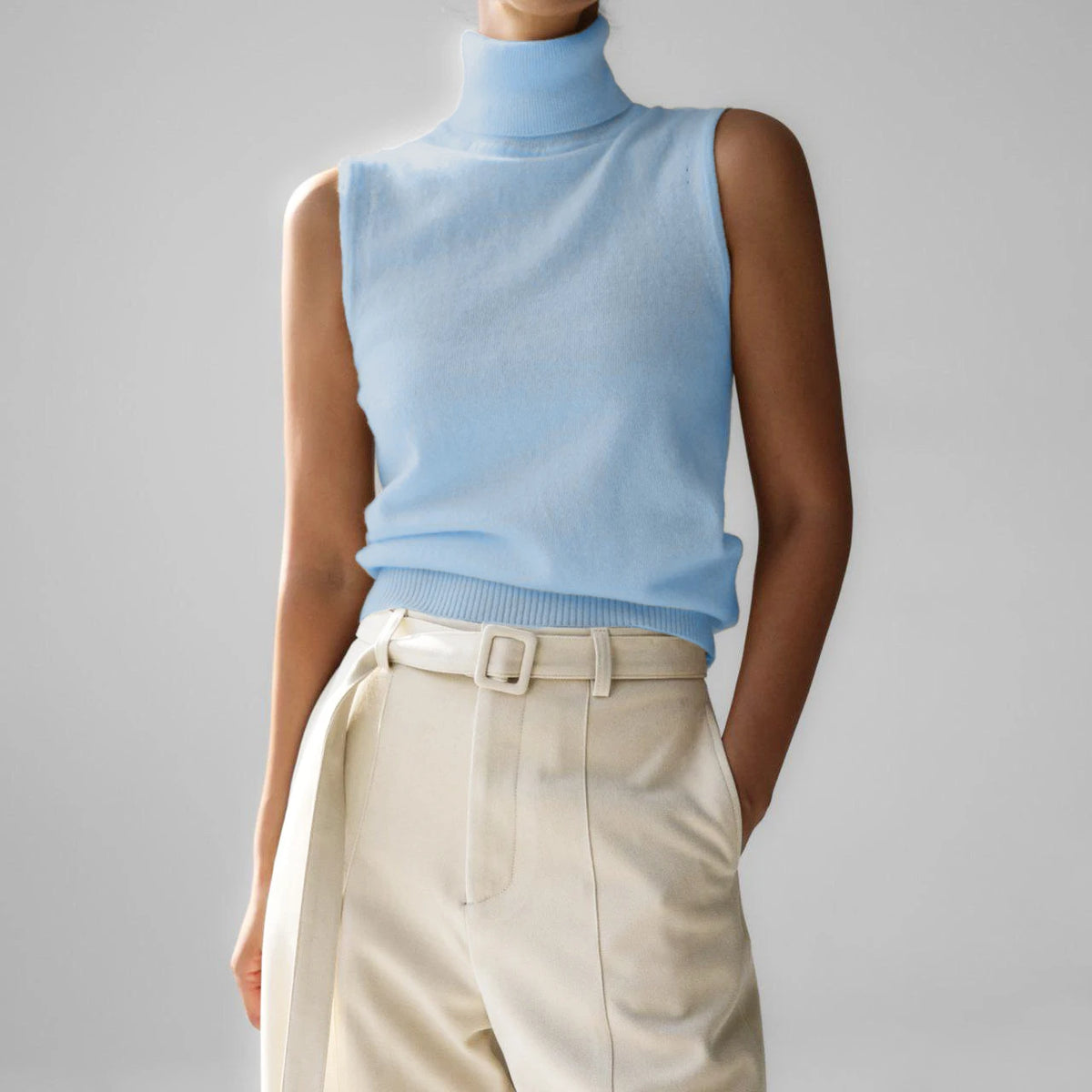 Pale blue roll neck sleeveless knit tank, front view