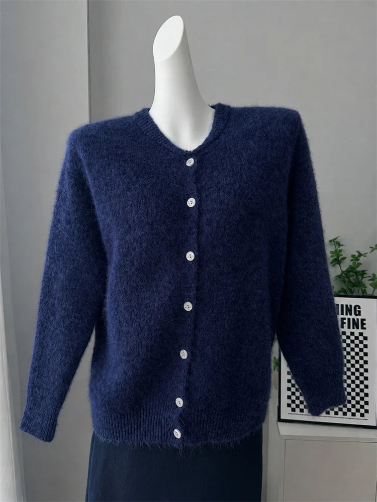 Navy fuzzy knit button cardigan on a mannequin, front view