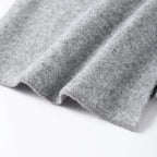 Close-up of the grey fine knit fabric