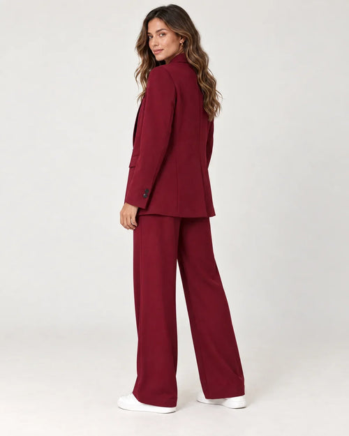 Dark red longline blazer and wide leg trousers suit set, back view